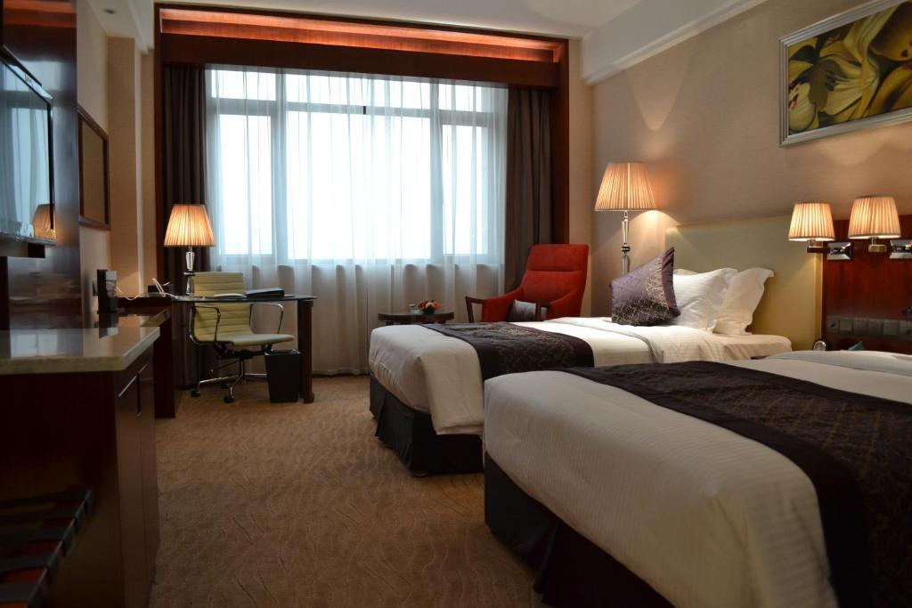 Wuhan Tianchimel Hotel Habitación foto